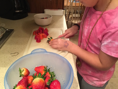 cutting strawberries